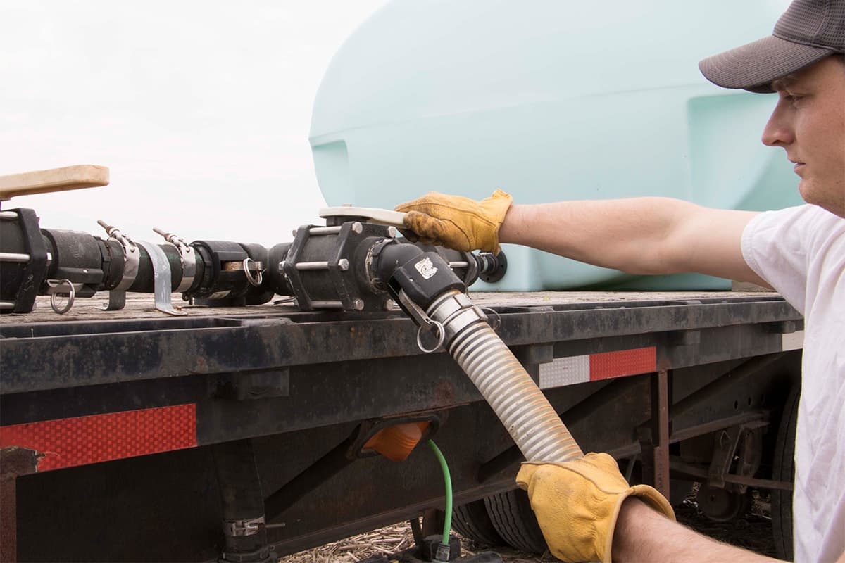 farmer using valve